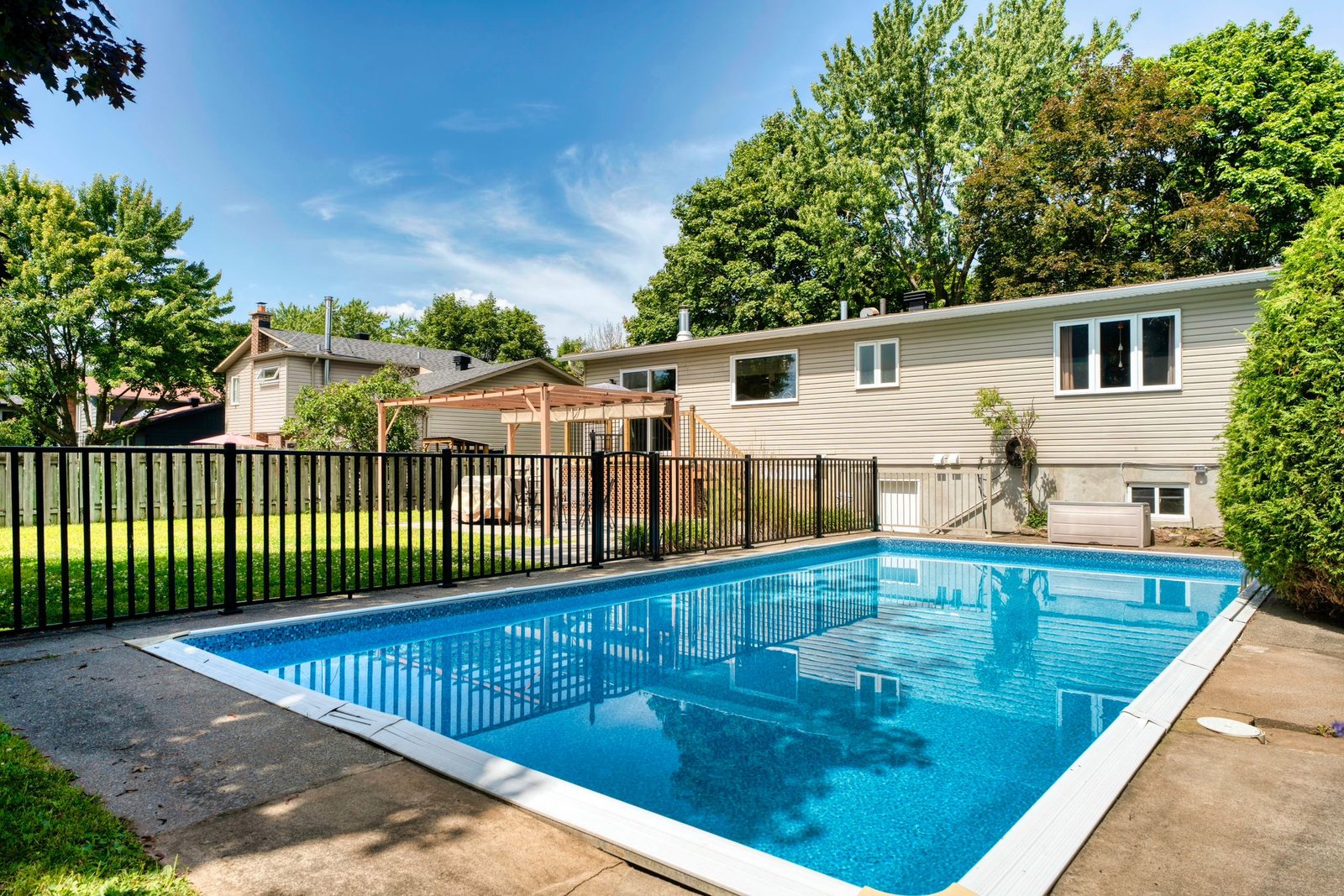 Backyard of bungalow for sale in Candiac